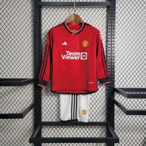 Kit de manga larga local del Manchester United para niños 2023/24