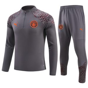 Sudadera y pantalón de adulto con media cremallera del Manchester City 902 2023/24