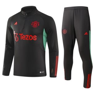 Sudadera y pantalón de adulto con media cremallera del Manchester United 902 2023/24