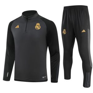 Sudadera y pantalón de adulto con media cremallera del Real Madrid 902 2023/24