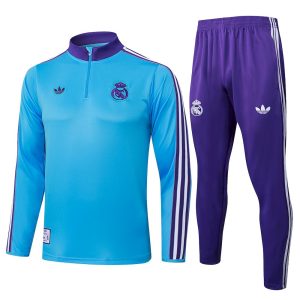 Sudadera y pantalón de adulto con media cremallera del Real Madrid 815 2025/26